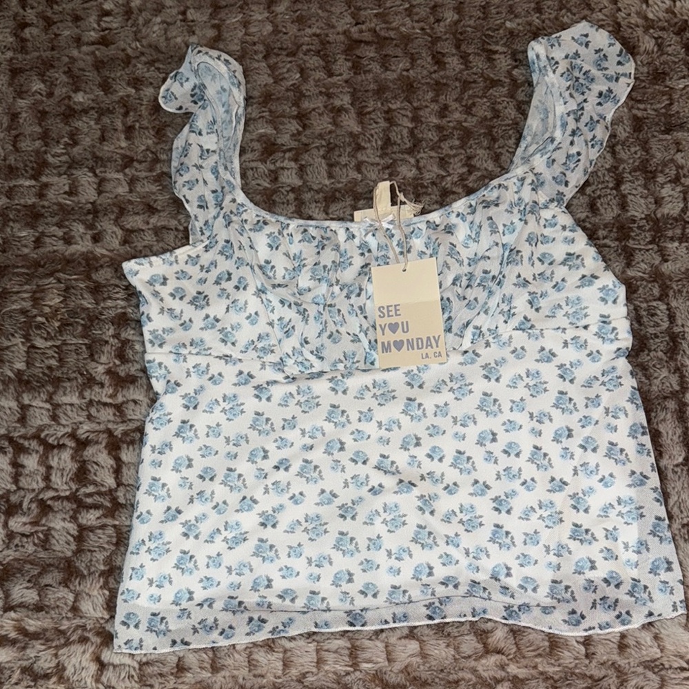 See You Monday Blue Ruffled Sleeveless Blouse
